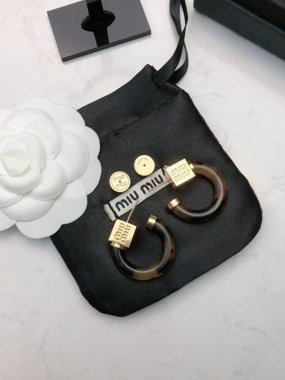 Miu Miu Tortoiseshell Lucite Hoop Earrings with Gold-Logo Accents - Picture 6 of 6